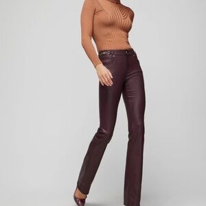 White House black market red cherry coated slim boot cut jeans.